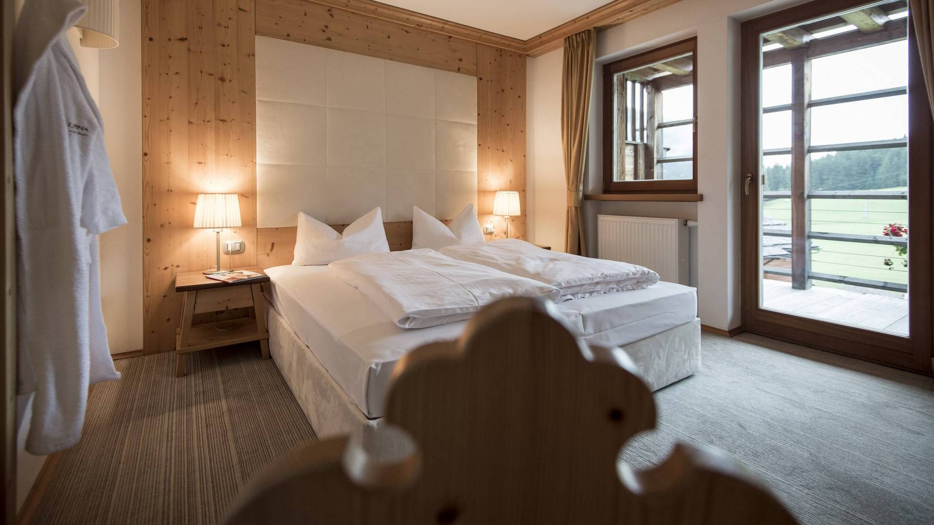 Das Familienhotel in Innichen mit Almdorf-Flair Das Familienhotel in Innichen mit Almdorf-Flair